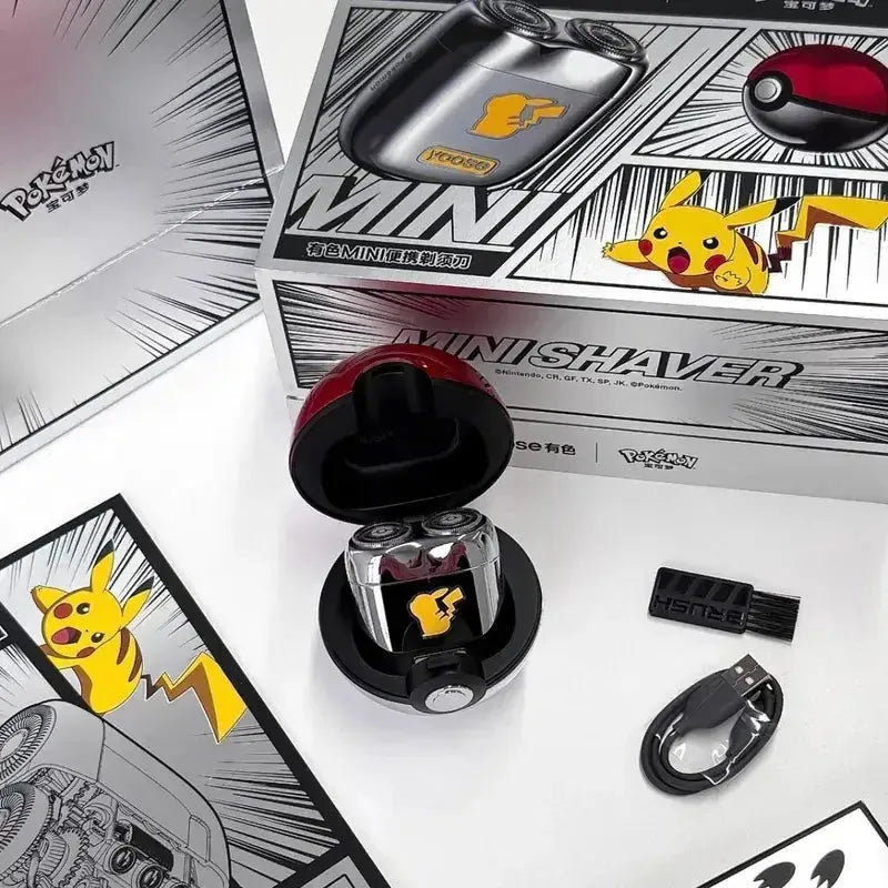 Open Pokéball case showing Yoose foil shaver, USB charging cable and brush