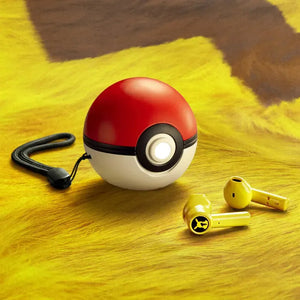 Pikachu Poké Ball earbud charging case and yellow earbuds