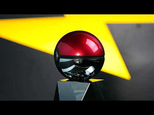Pokéball-inspired travel case for Yoose Pikachu electric shaver, displayed on stand