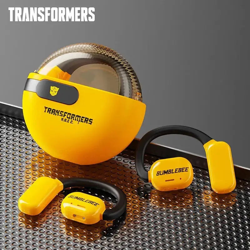 Transformers yellow earhook and black open-ear earphones displayed together