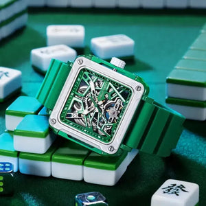 Green Fortune Mahjong skeleton watch displayed on mahjong tiles